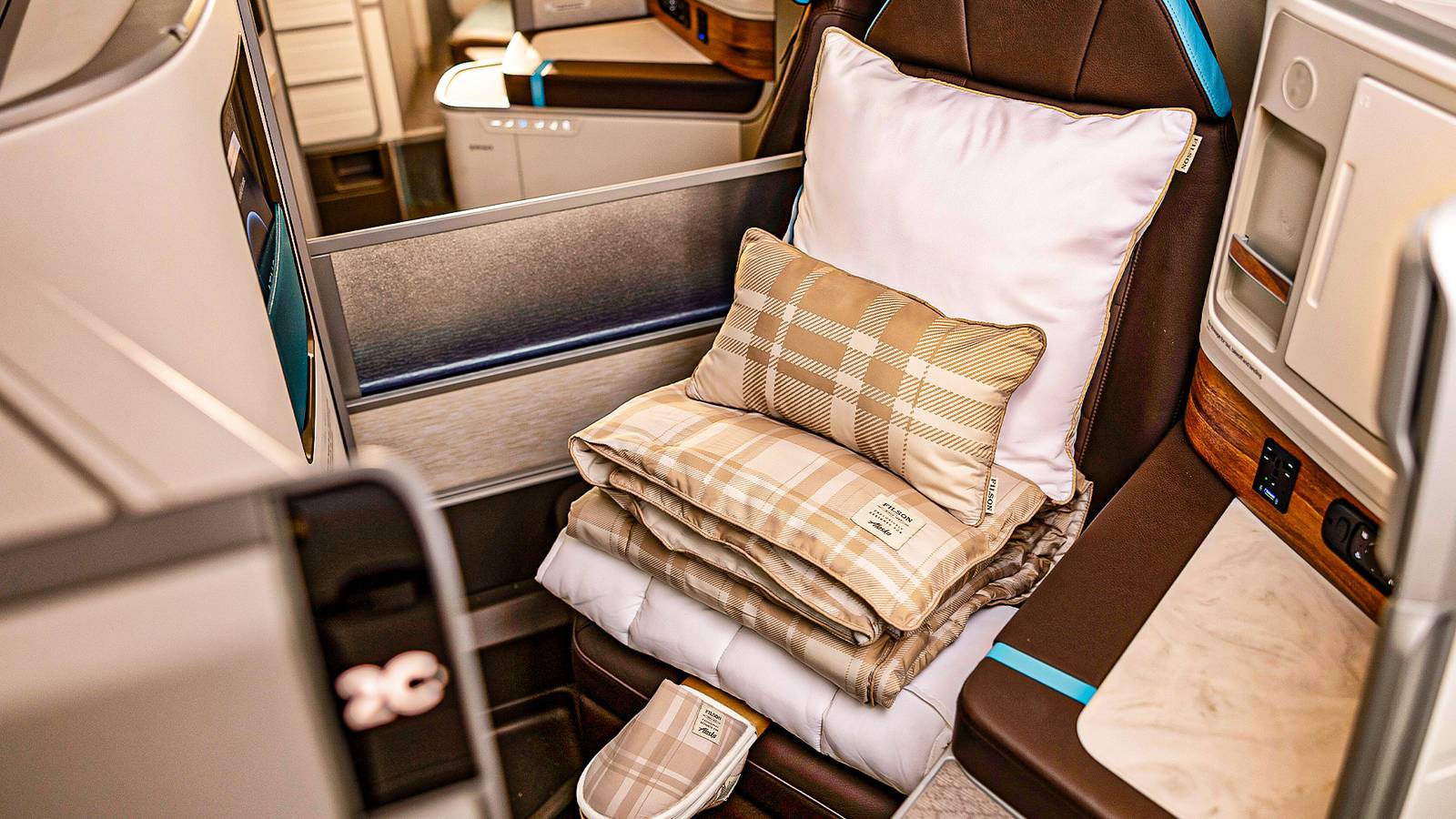 How Alaska Airlines' New Business Class Suites Stack Up Against Delta One & United Polaris In 2026