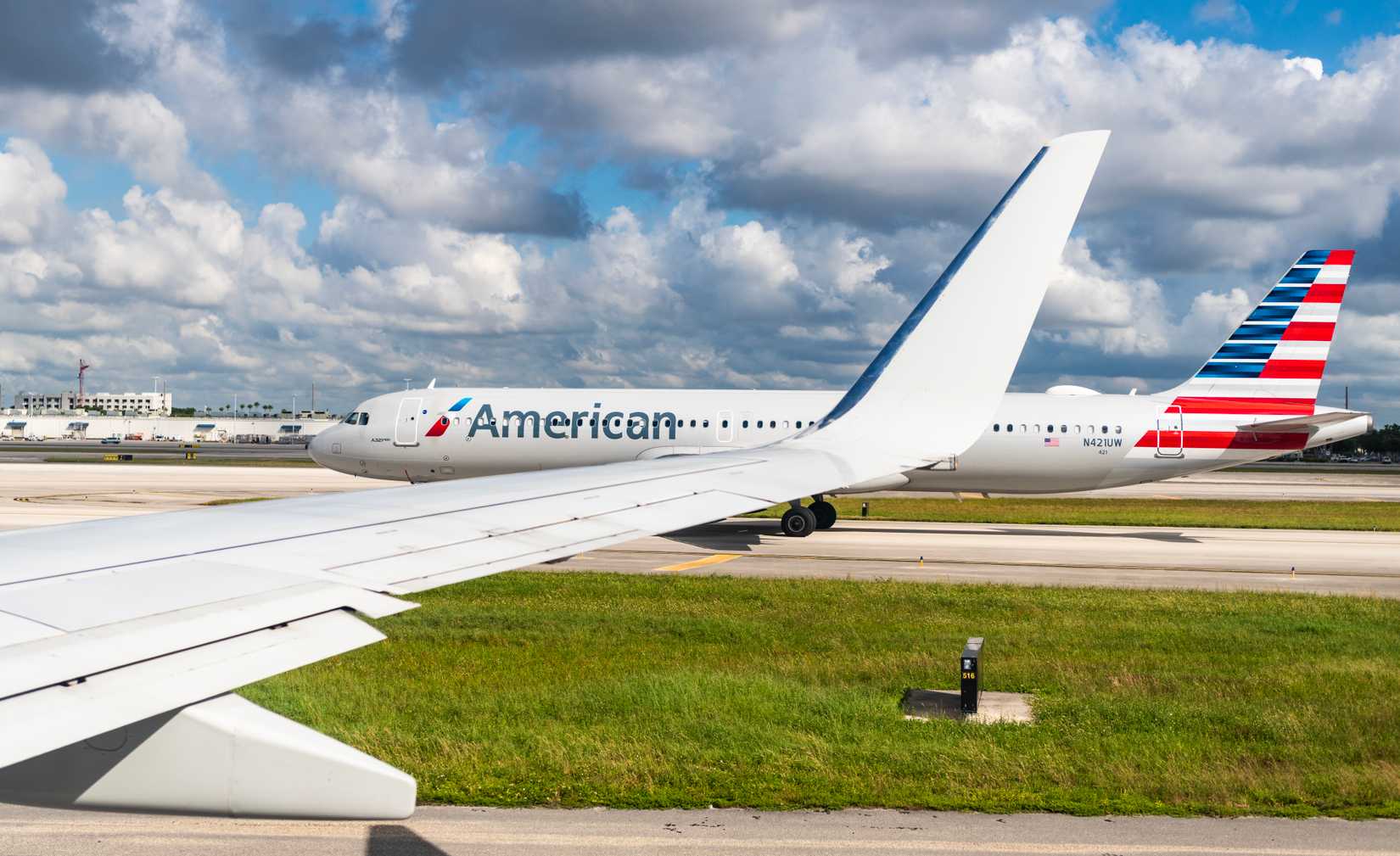 American airlines planes taxi for departure.
