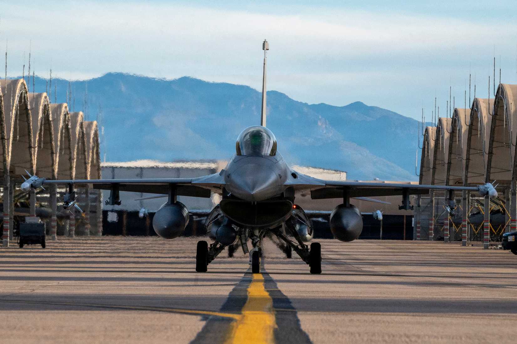 An F-16 Fighting Falcon assigned to the 122nd Fighter Wing taxis on the flight line at Morris Air National Guard Base.-1