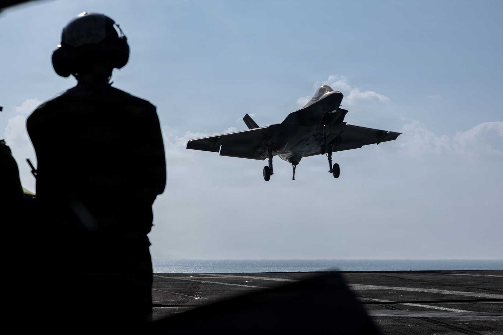 An F-35C Lightning II, attached to Marine Fighter Attack Squadron (VMFA) 314, prepares to make an arrested landing on the flight deck.