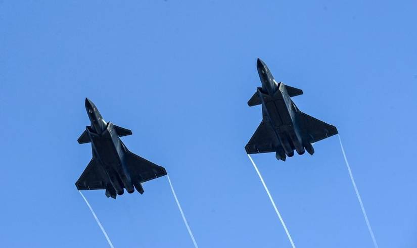 China's J-20 stealth fighter jets perform in formation during Airshow China in Zhuhai, south China's Guangdong Province, Nov. 12, 2024.