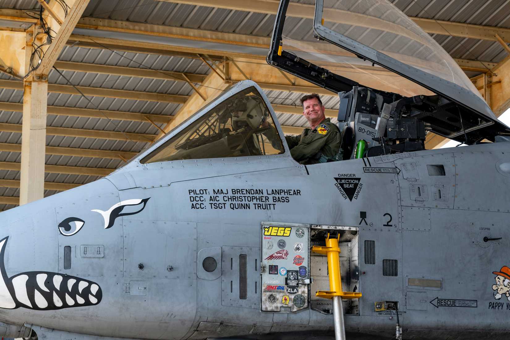 Colonel Brian Leiter sits in the cockpit of an A-10 Warthog after his final flight.