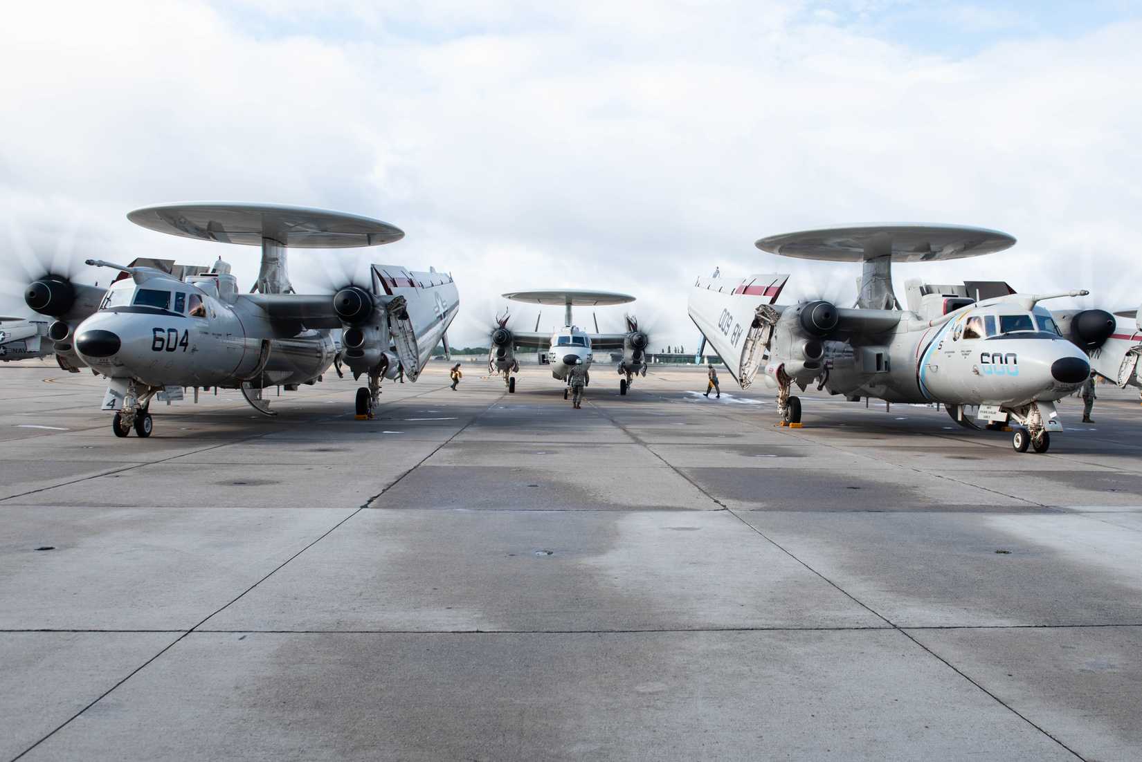 E-2D Hawkeye aircraft attached to Airborne Command & Control Squadron (VAW) 126 “Seahawks” taxi to a stop onboard Naval Station Norfolk, May 30, 2025.