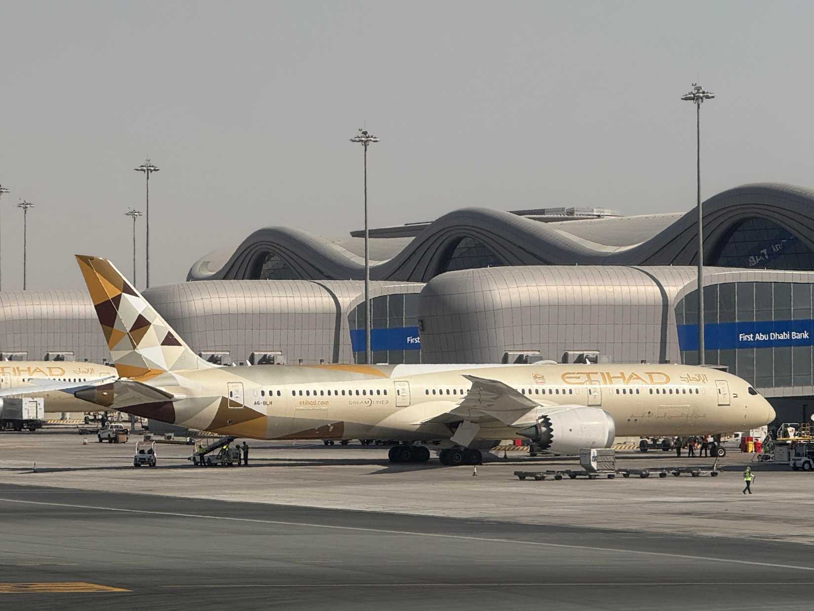 Etihad Airlines plane at Zayed International Airport in Abu Dhabi, UAE.