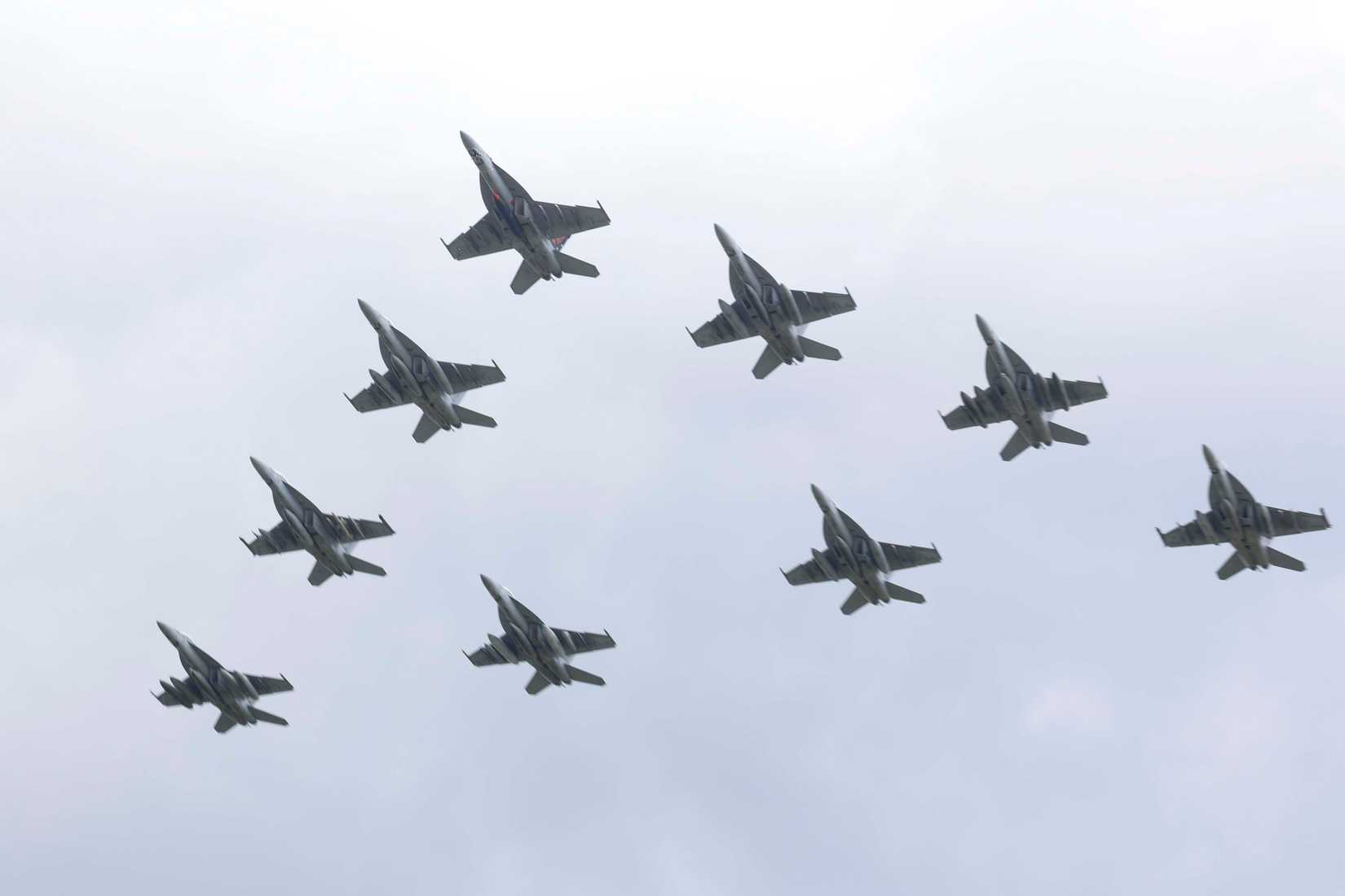 FA-18E Super Hornets assigned to the Sunliners of Strike Fighter Squadron (VFA) 81 fly in formation over Naval Air Station (NAS) Oceana during the squadron's 2025 homecoming.