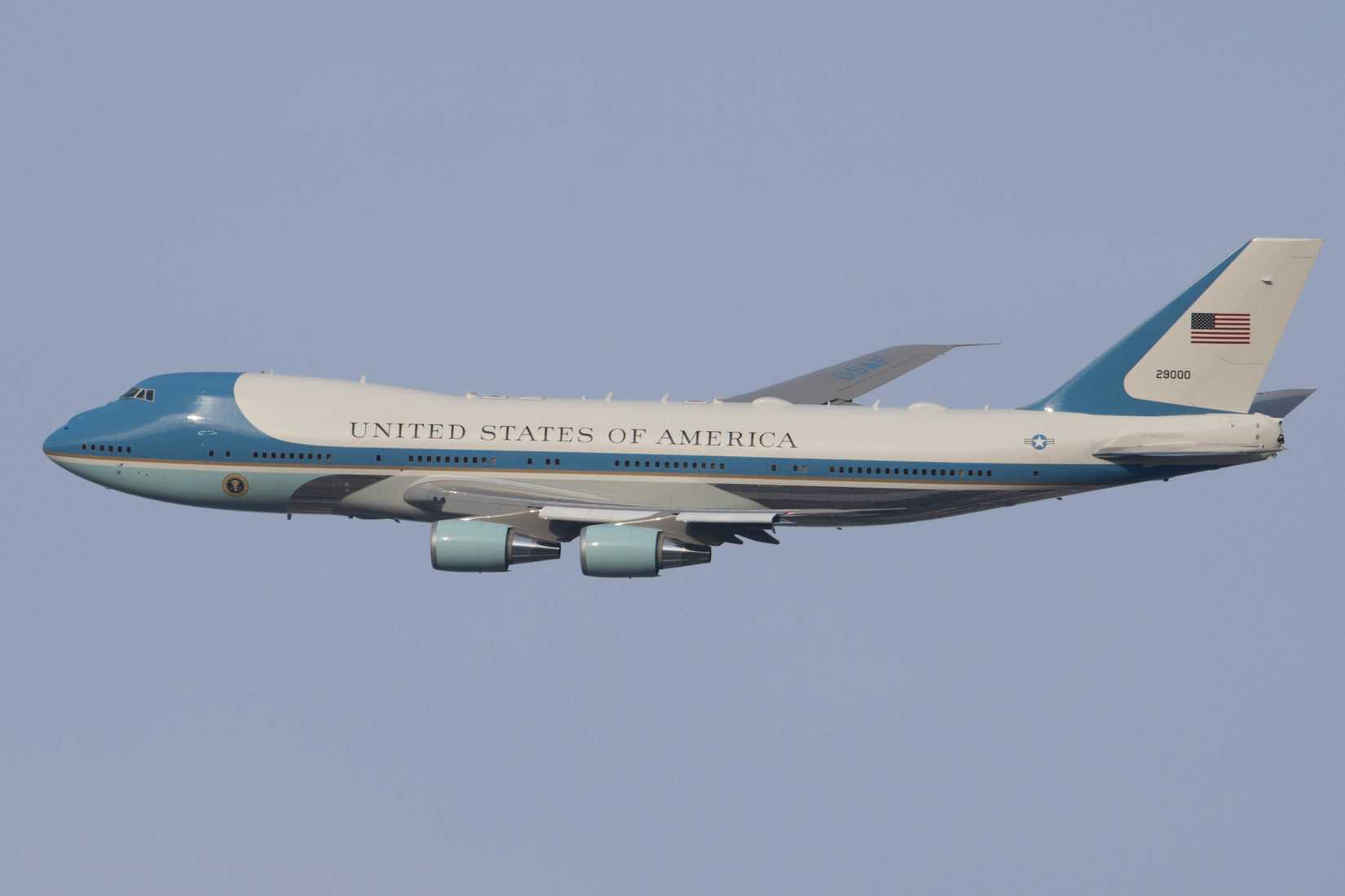 Former President George W. Bush and family with George H.W. Bush's casket flyover the George Bush Library at Texas A&M University.