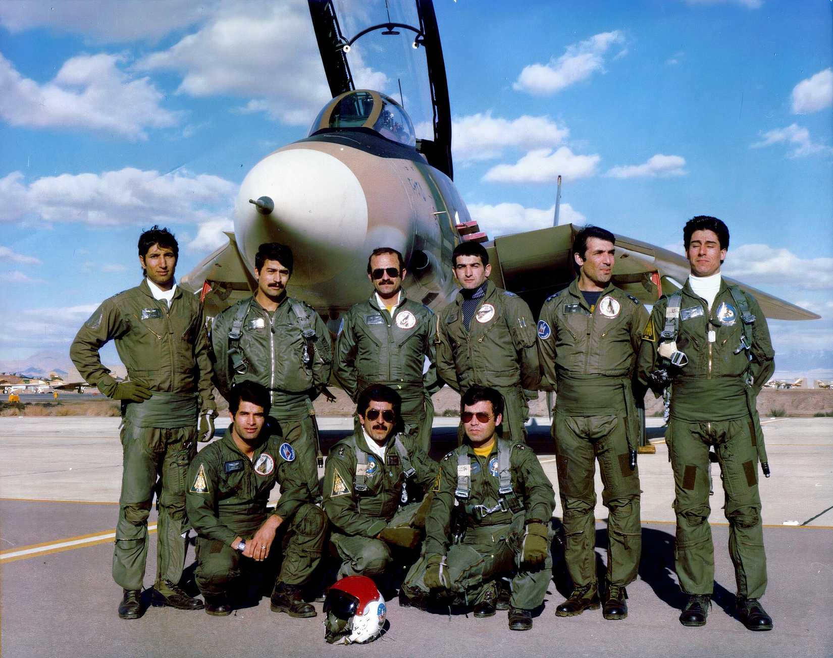 Iranian pilots standing in front of an F-14