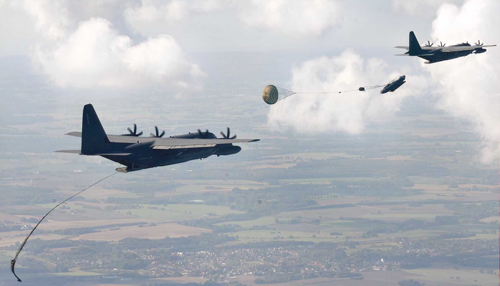 Two U.S. Air Force MC-130J Commando IIs perform Maritime Craft Aerial Delivery System 