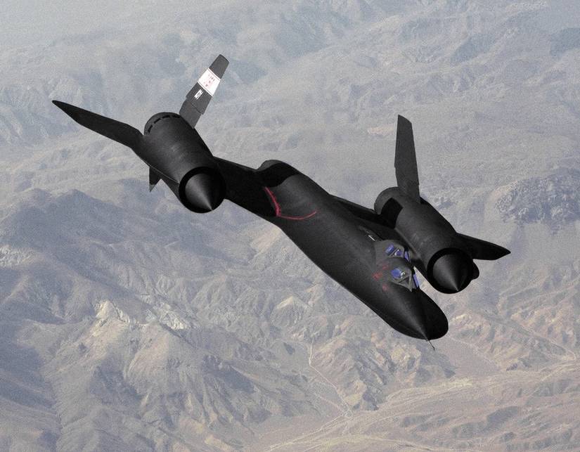 NASA's SR-71B, one of three triple-sonic SR-71s loaned to NASA by the Air Force, cruises over the Tehachapi Mountains on a flight from the NASA Ames-Dryden Flight Research Facility.