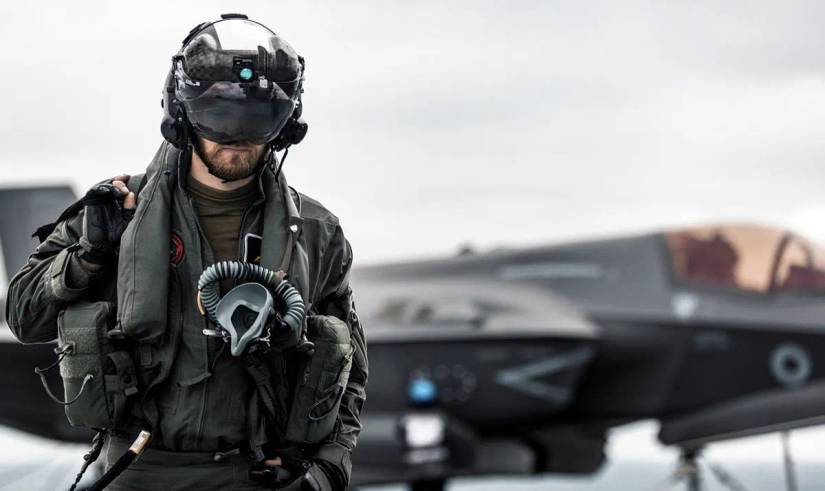 Royal Navy F-35B pilot walking away from plane.