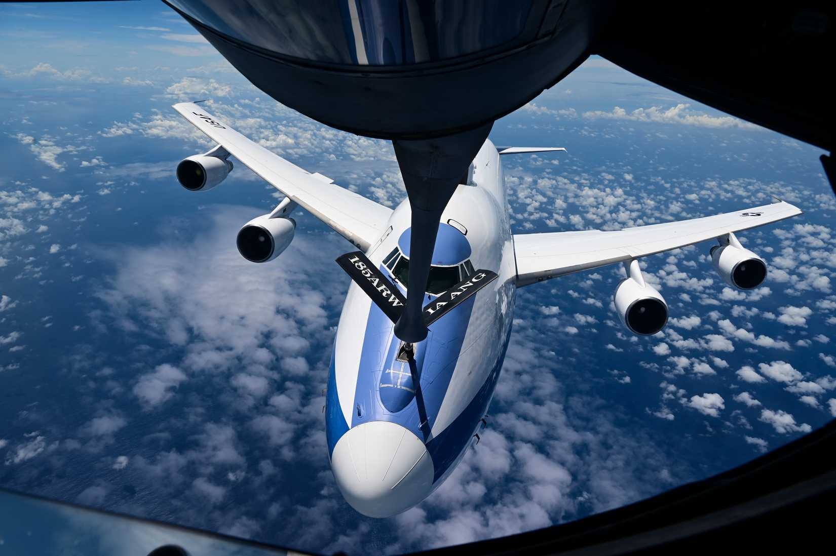 Secretary of Defense Lloyd J. Austin III's U.S. Air Force E-4B aircraft is refueled by KC-135 Stratotankers, assigned to the 50th Expeditionary Air Refueling.