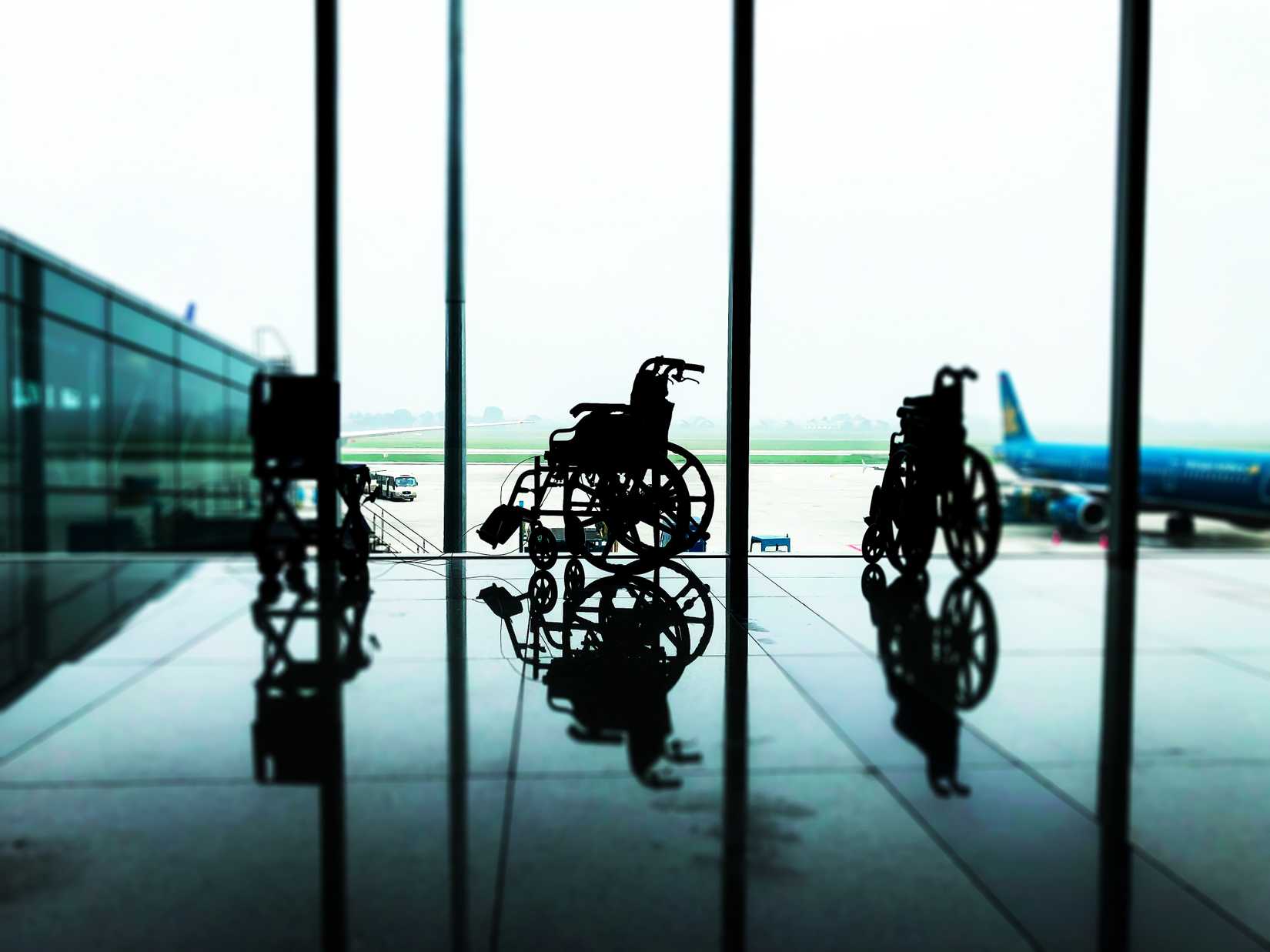 Wheelchairs At An Airport Gate