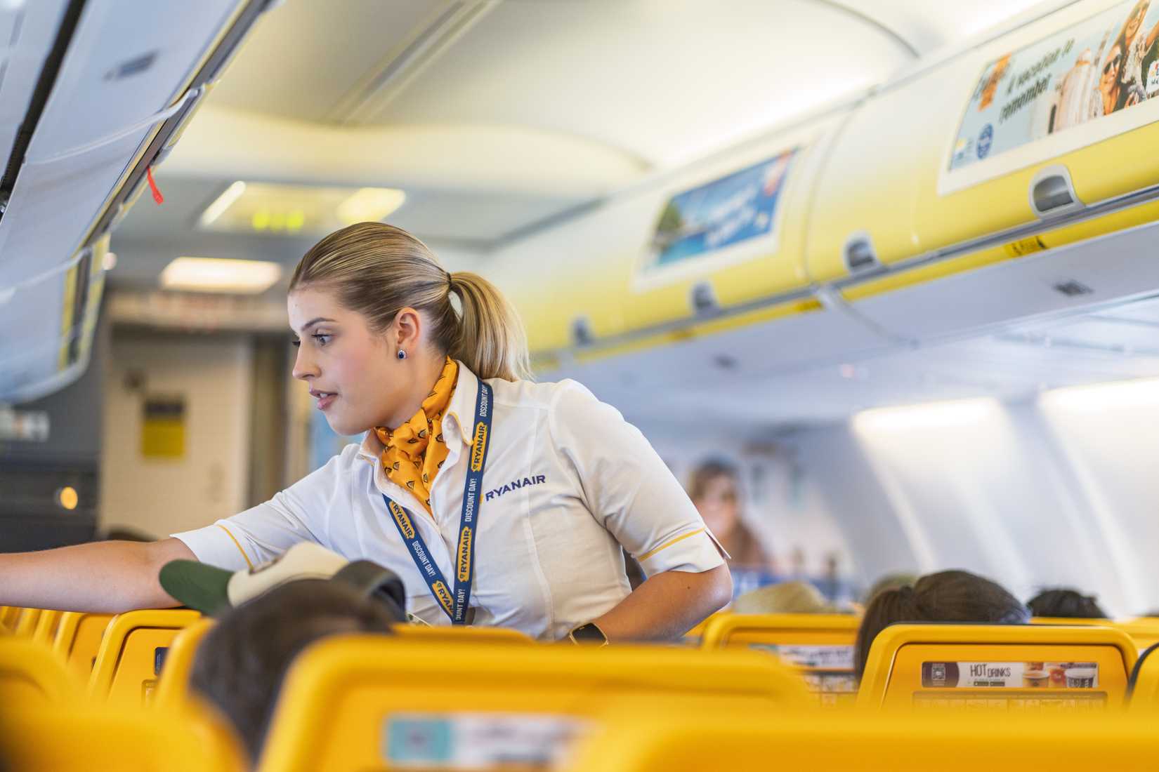 Ryanair cabin crew performing safety checks