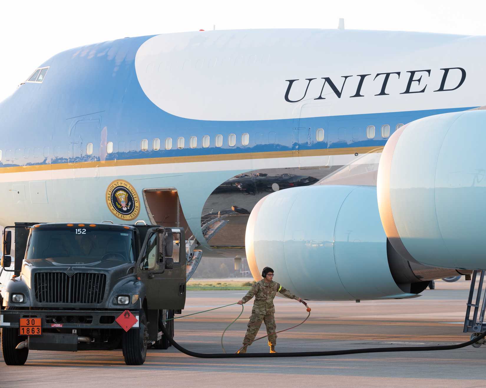 U.S. Air Force Airman 1st Class Andy Peralta, 86th Logistics Readiness Squadron fuels distribution operator, helps refuel Air Force One at Ramstein Air Base, Germany, Sept. 8, 2023. Members of the 86th LRS and 86th Security Forces Squadron served an important role, working with the U.S. Secret Service to ensure the security of Air Force One and to efficiently refuel the aircraft so it could continue its mission of transporting the President of the United States. (U.S. Air Force photo by Senior A