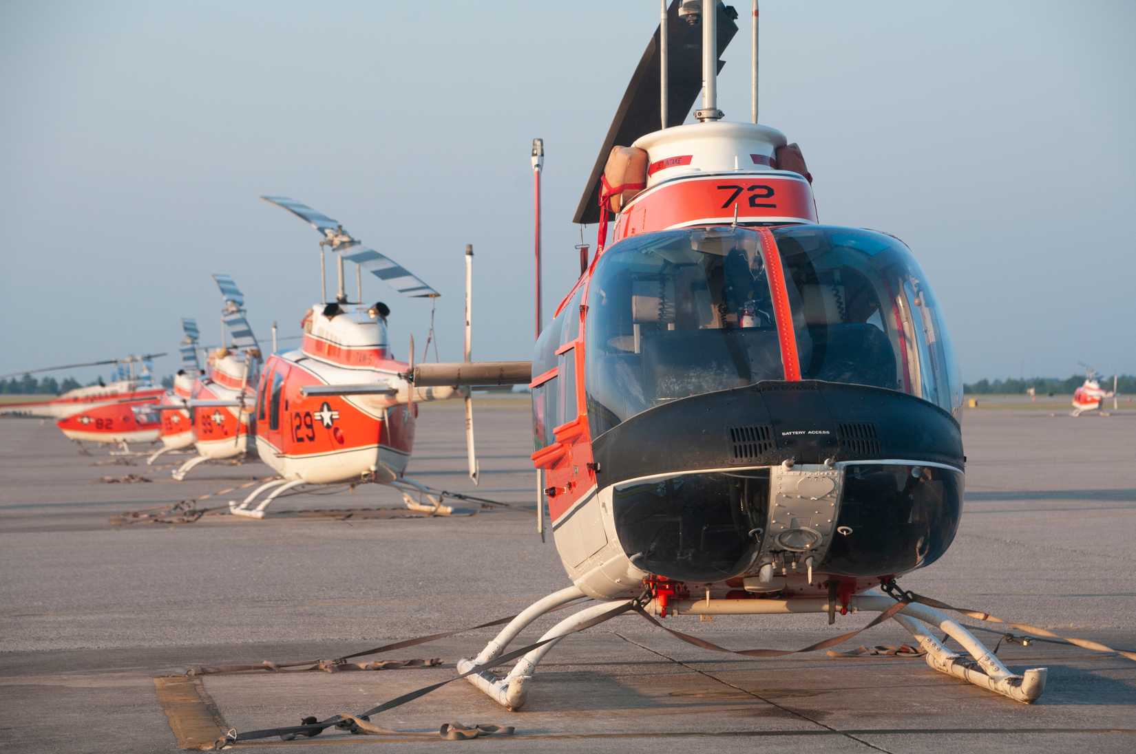 TH-57 Sea Ranger helicopters from Training Air Wing (TW) 5 sit on the flightline at Naval Air Station Whiting Field in Milton, Florida.