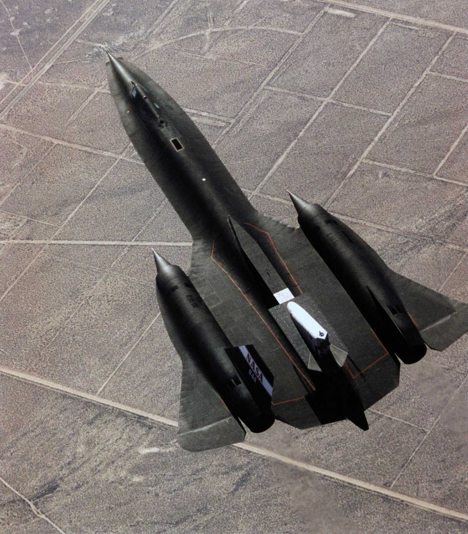 This photograph shows the SR-71 with the Linear Aerospike SR-71 Experiment on the rear fuselage as seen from above.