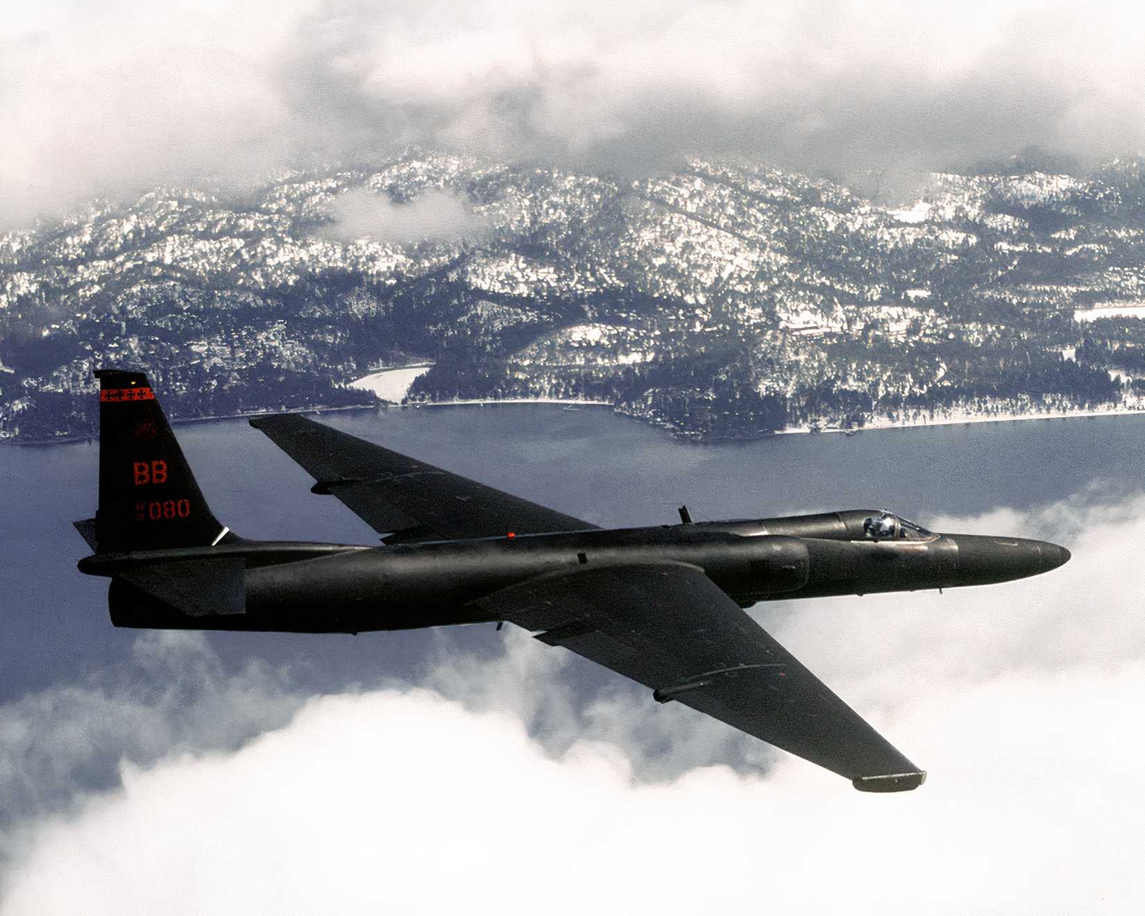 U-2 flying against a background of snow covered mountains
