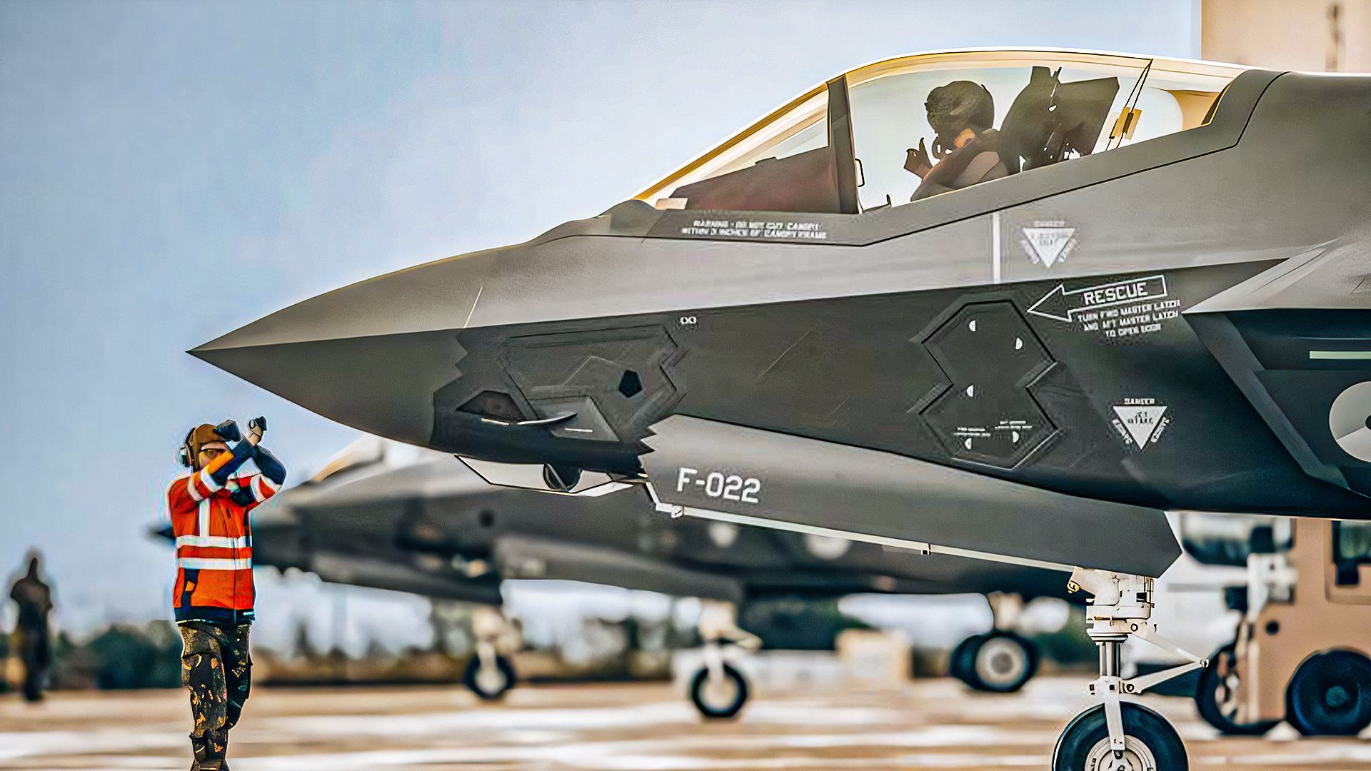 A Pilot Next To An F-35 Jet