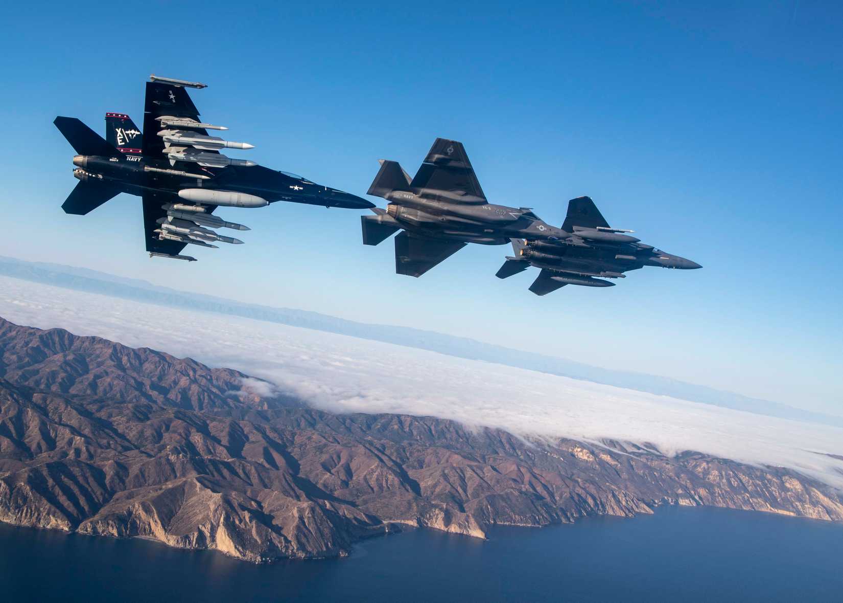 VX-9 FA-18F and F-35 and USAF F-15 over Point Mugu