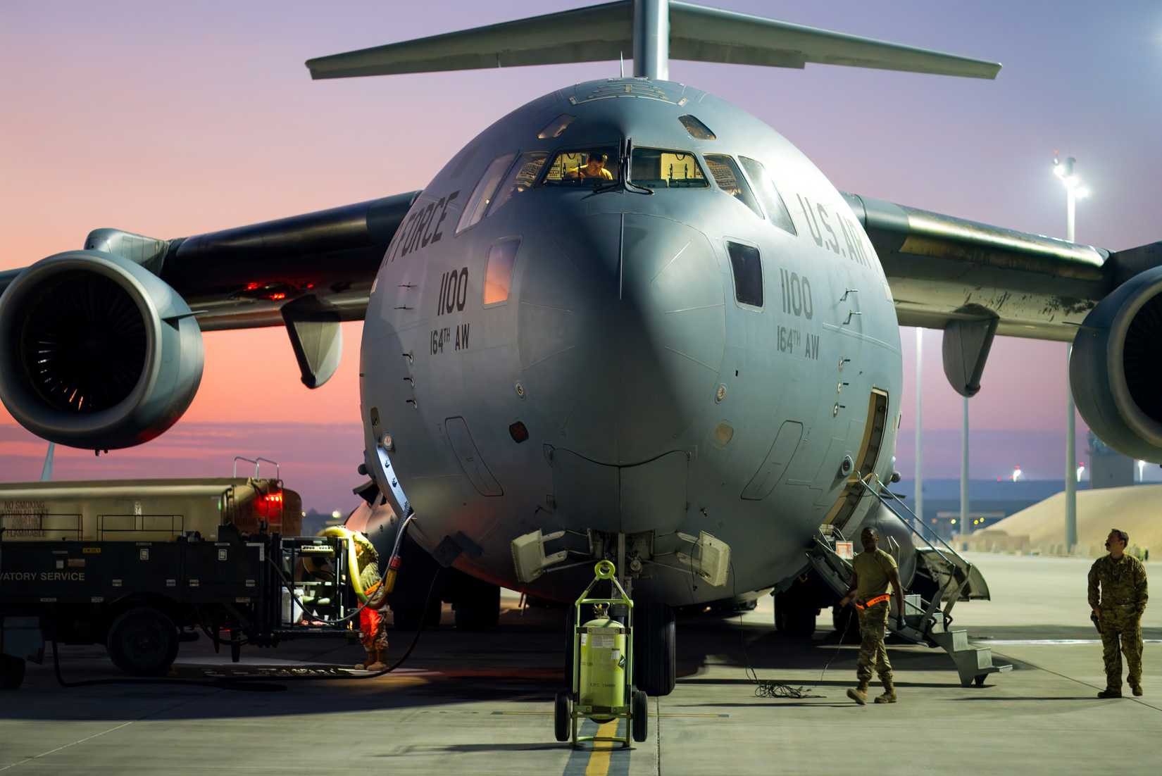 A C-17 Globemaster III with the 155th Airlift Squadron sits on the apron in Al Udeid Air Base, Qatar December 9, 2024.