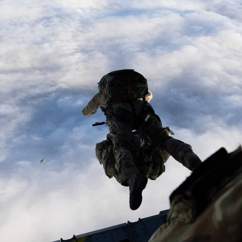 A medic steps off the ramp of an RAF A400M during aerial insertion to provide hantavirus aid.