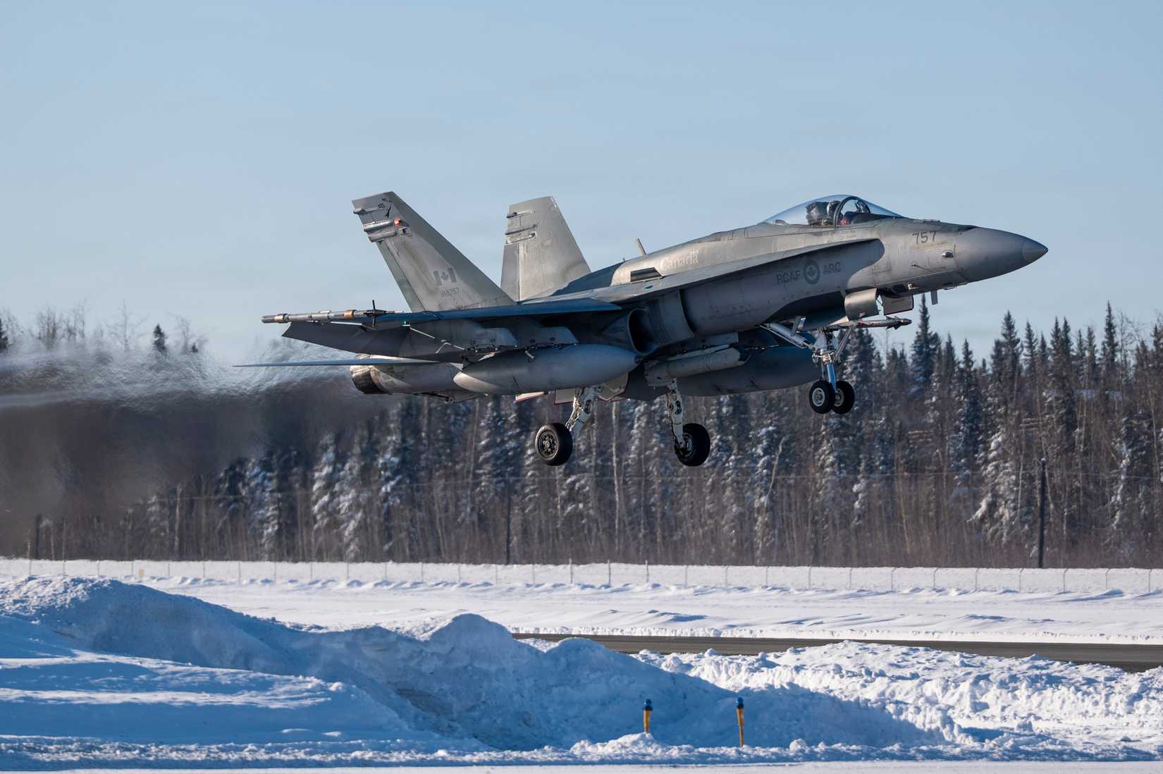 A Royal Canadian Air Force CF-18 Hornet assigned to the 425th Tactical Fighter Squadron takes off during ARCTIC EDGE 2026.