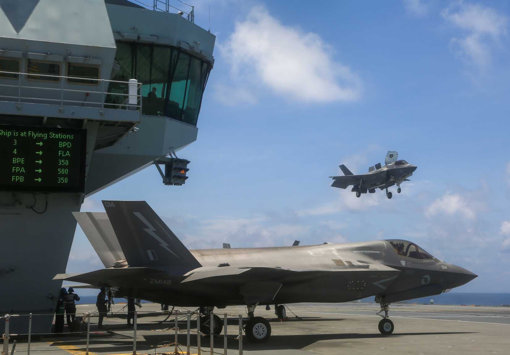 A USMC F-35B Lightning II lands aboard HMS Queen Elizabeth in the Indo-Pacific on August 05, 2021.