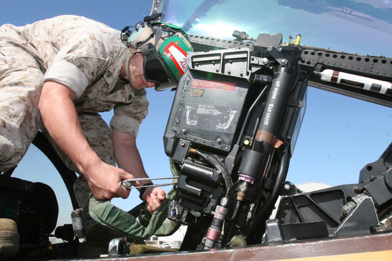 US Marine Inspecting FA-18 Ejection Seat