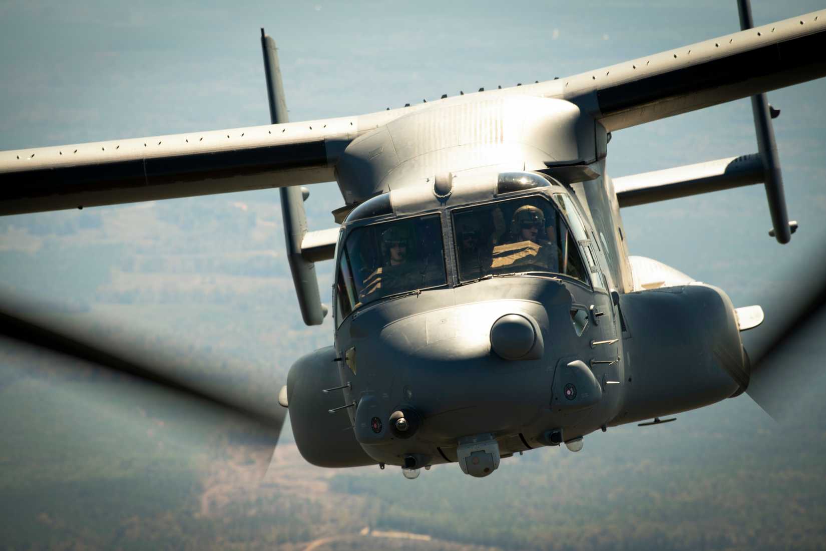 Air Force air commandos, assigned to the 8th Special Operations Squadron, participate in a training flight on a CV-22 Osprey.