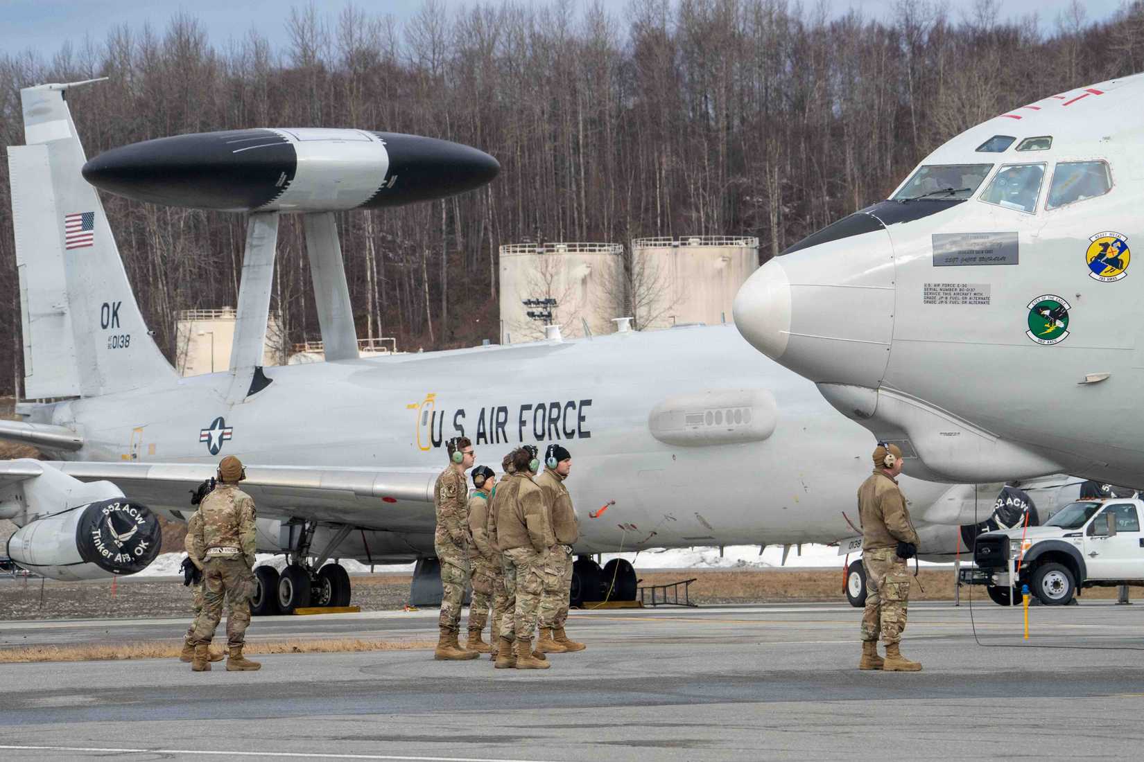Air Force Airmen from the 718th Aircraft Maintenance Squadron prepare an E-3 Sentry assigned to the 962nd Airborne Air Control Squadron.