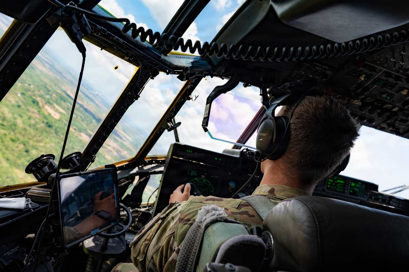 Air Force Capt. Eric Christensen, a pilot assigned to the 40th Airlift Squadron, conducts a low-level formation flight in a C-130J Super Hercules.