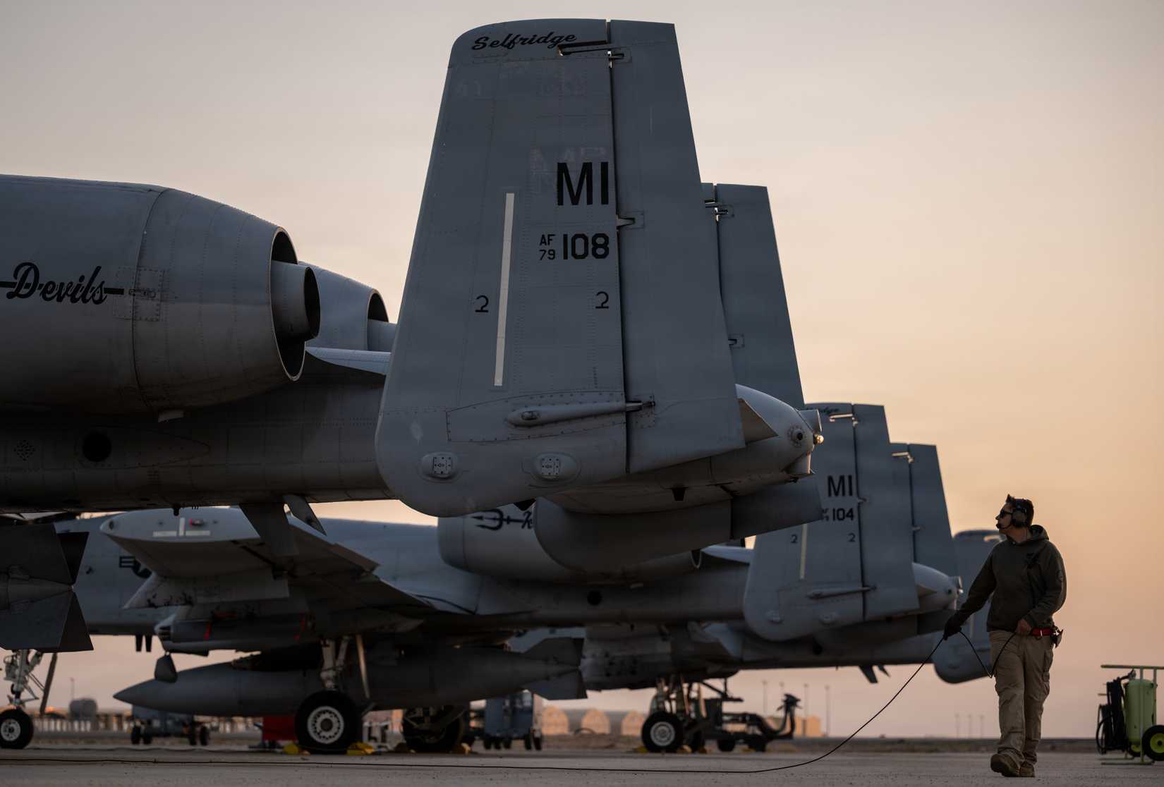 Air Force crew chief performs a pre-flight inspection on an A-10 Thunderbolt II aircraft at a base in the Middle East, April 28, 2026.