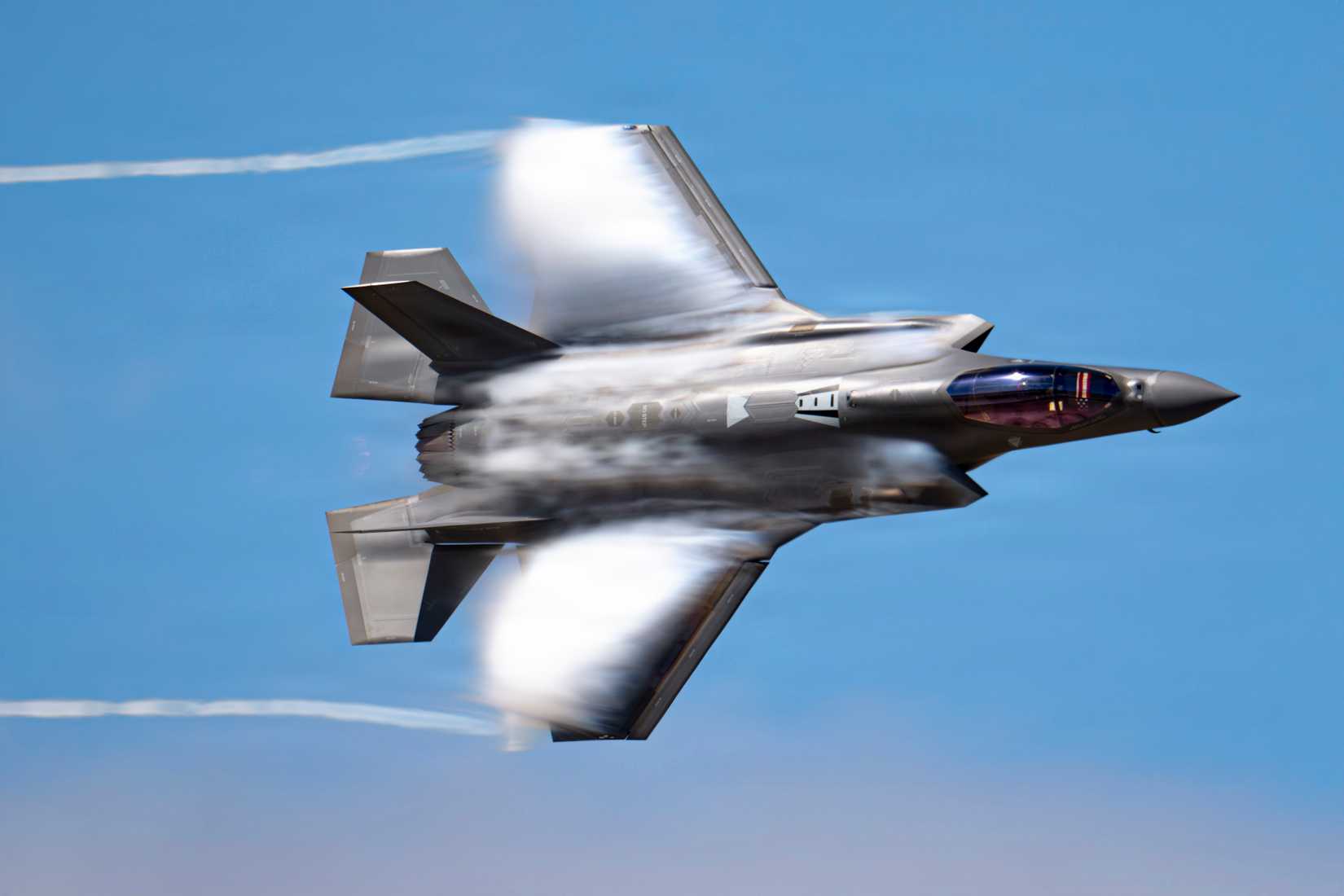 Air Force F-35A Lightning II from the F-35A Demonstration Team performs a dedication pass during the Fiesta of Flight air show over Laughlin Air Force Base.