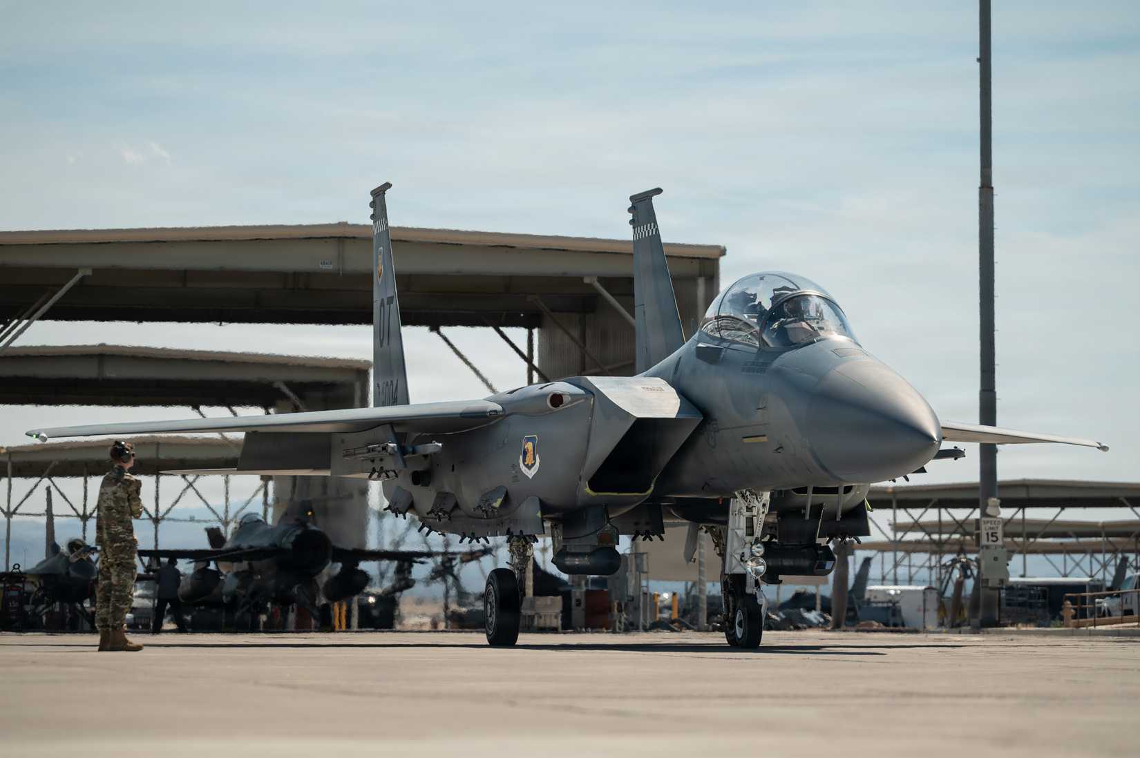 Air Force Maj. Matthew Benson, an F-15EX Eagle II aircraft pilot assigned to the 85th Test and Evaluation Squadron, and Indian Air Force Air Chief Marshal Amar Preet Singh prepare for a familiarization flight.