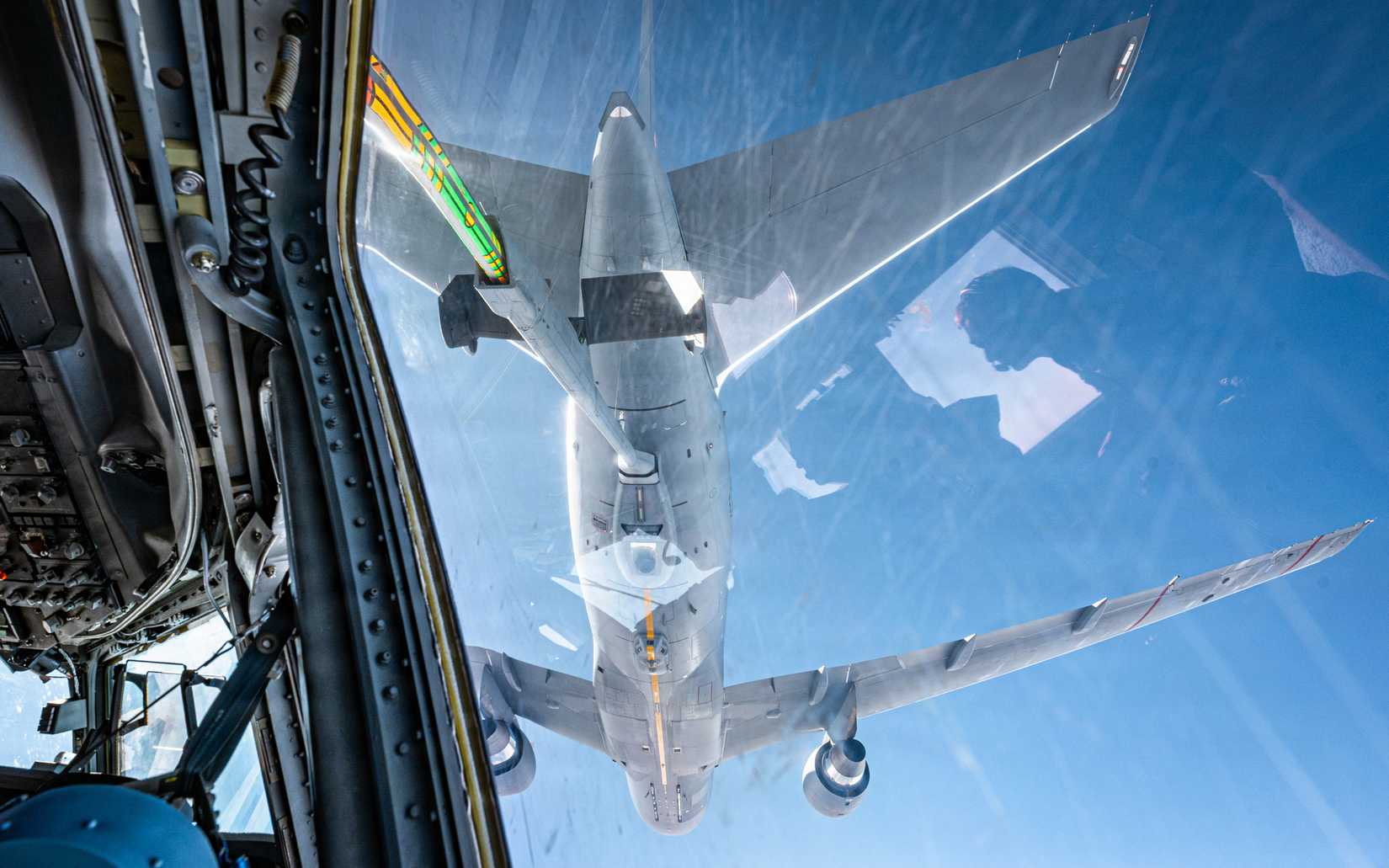Air Force mobility force aviator aboard a KC-46 Pegasus refuels a C-17 Globemaster III in support of Exercise Palmetto Reach, Hawaii, Jan. 14, 2026.