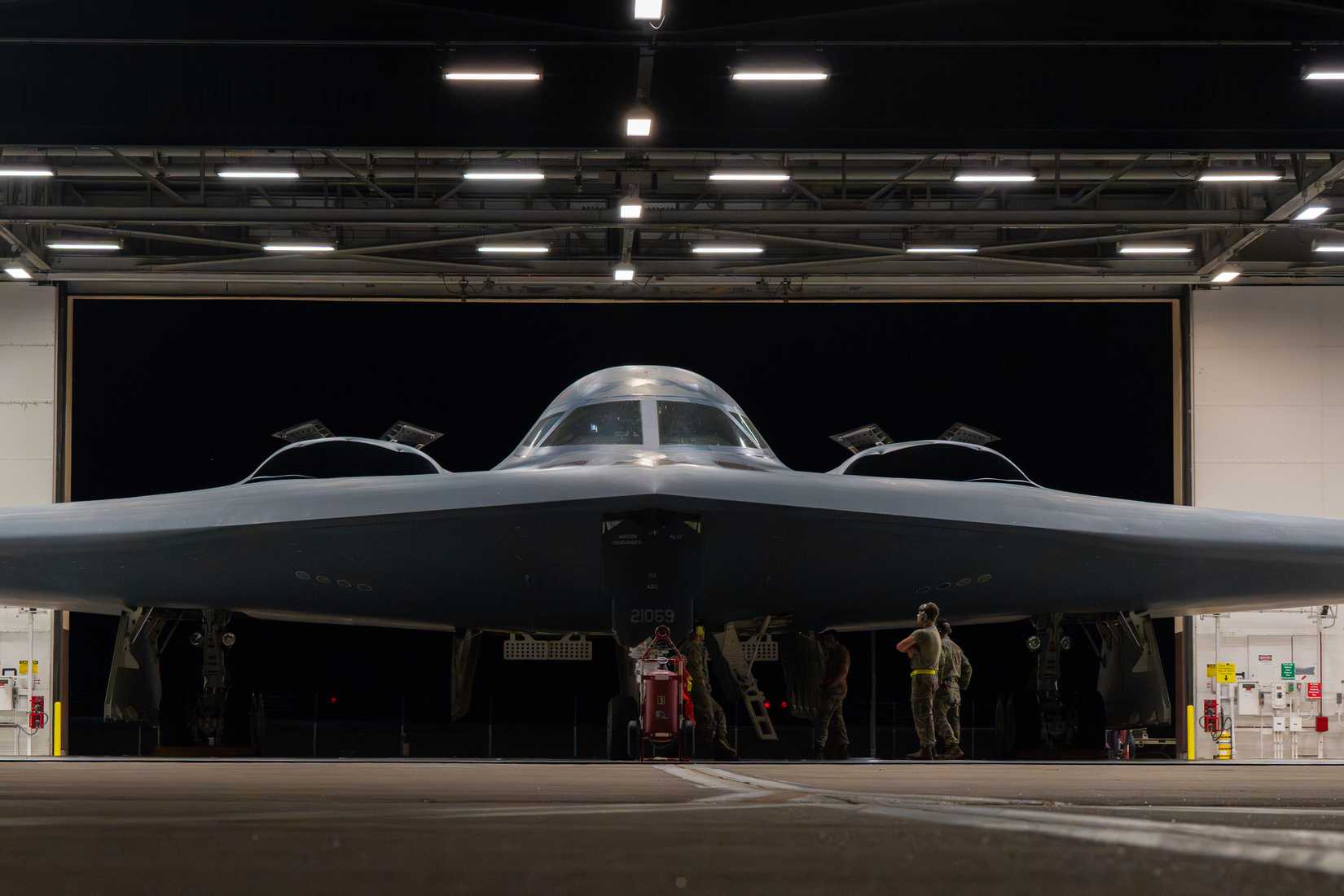 Airmen assigned to the 393rd Bomber Generation Squadron prepare a B-2 Spirit aircraft carrying Joint Direct Attack Munitions for departure at Whiteman Air Force Base, Missouri, Sept. 2, 2025.