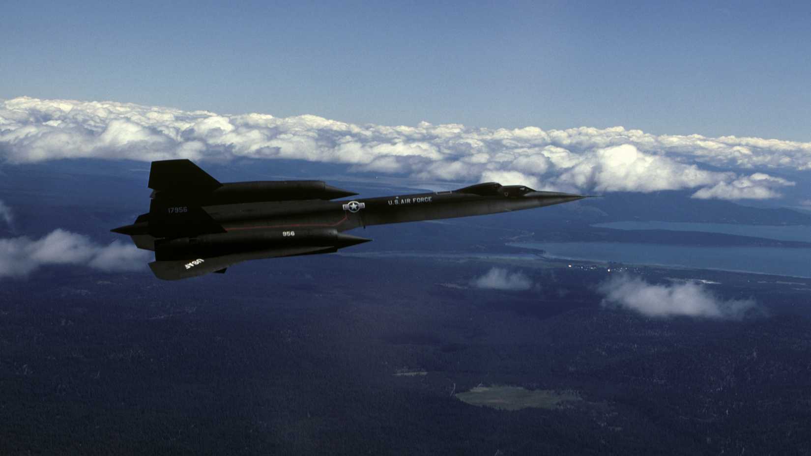 An air-to-air right side view of an SR-71B aircraft