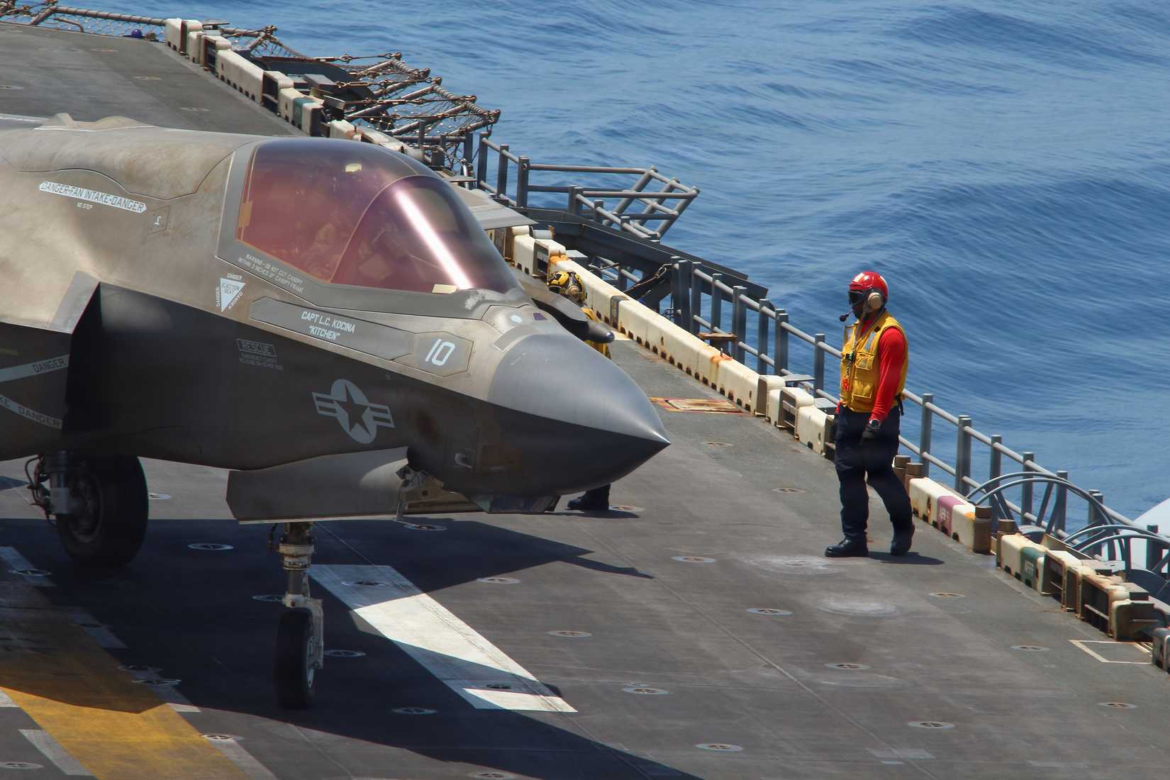 An F-35B Lighting II, attached to Marine Fighter Attack Squadron 121, prepares to take off from the flight deck.