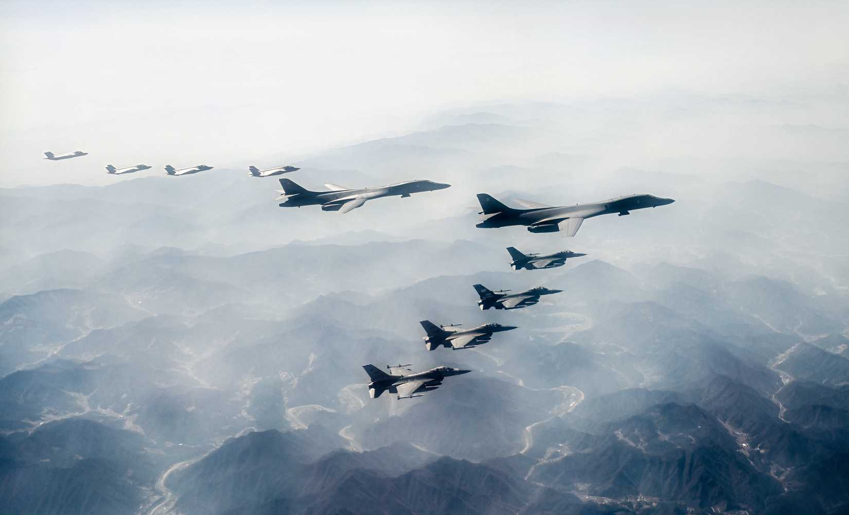 Two B-1B's with eight escorting fighters.