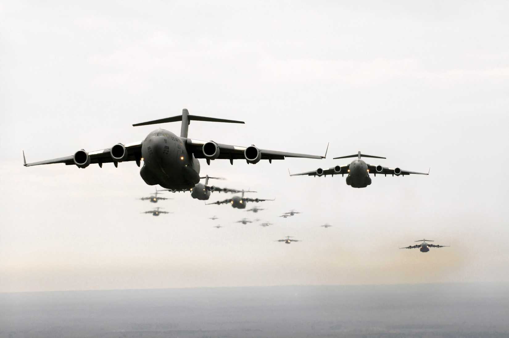 A fleet of C-17's are airborne.