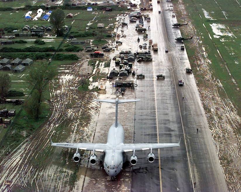 C-17 parked on a landing strip during a humanitarian operation in Albania