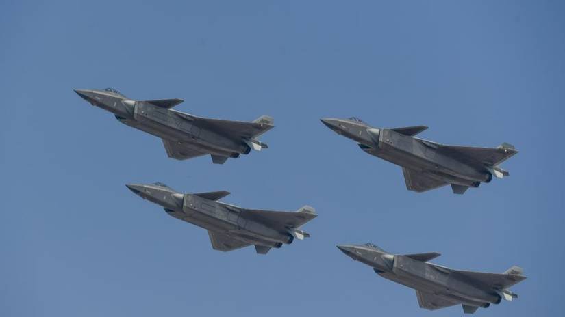 China's J-20 stealth fighter jets perform in formation during Airshow China in Zhuhai, south China's Guangdong Province, Nov. 12, 2024.