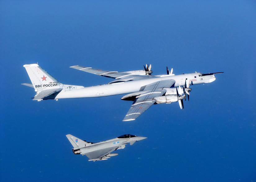 A Eurofighter is photographed intercepting a Russia Bear strategic bomber.