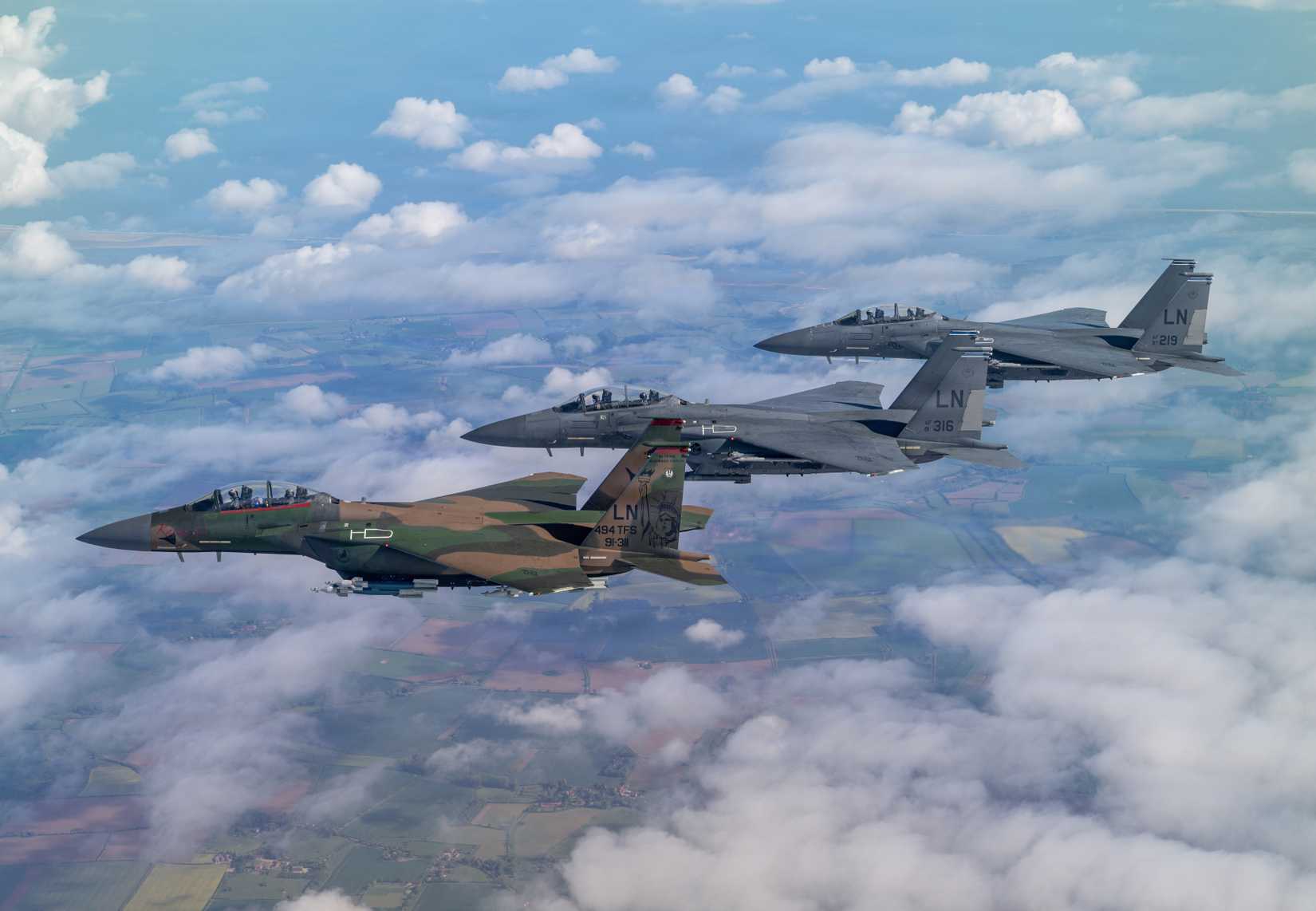 F-15E Strike Eagle aircraft assigned to the 494th Fighter Squadron fly in formation above the United Kingdom, May 7, 2026.