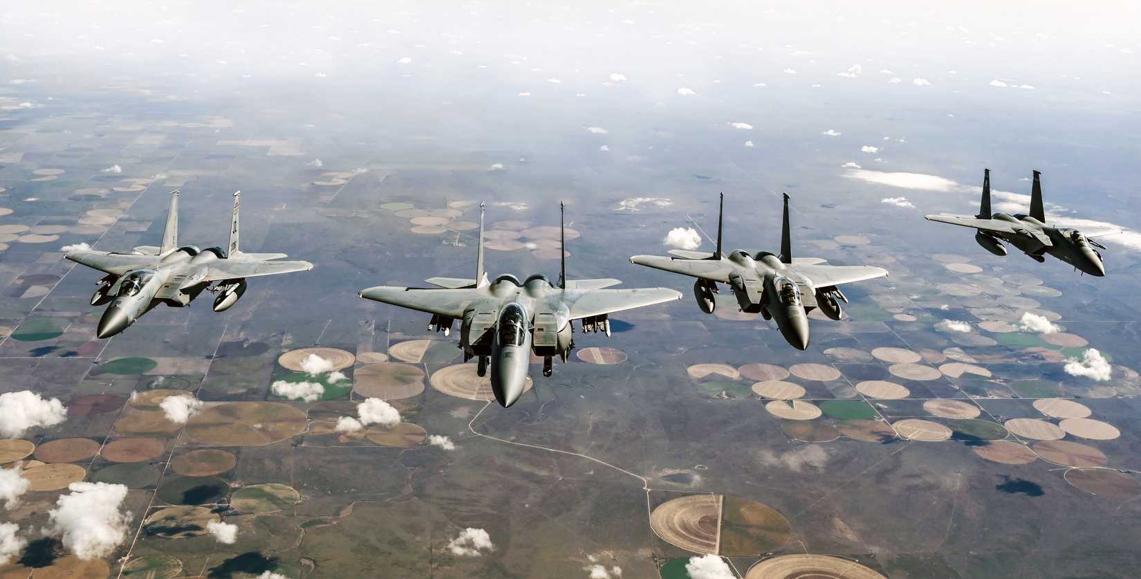 F-15s flying over open countryside