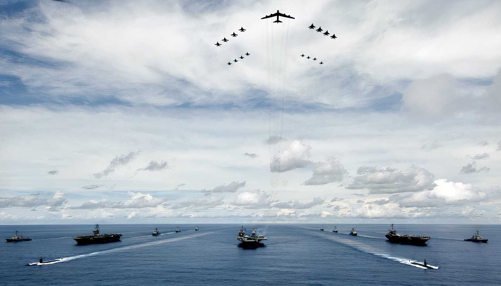 US naval vessels sail in formation