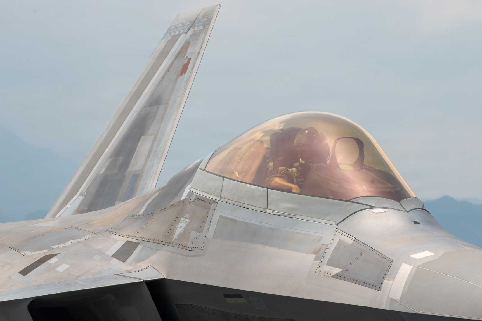 ir Force F-22 Raptor from the 199th Air Expeditionary Squadron conducts preflight checks during Exercise Cope Thunder 26-1.