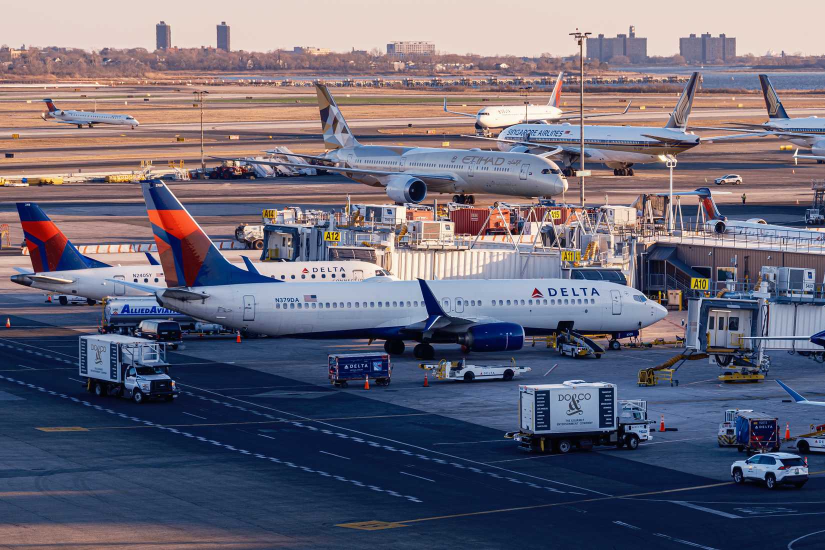 JFK Airport with Delta aircraft and other airlines' aircraft on ground