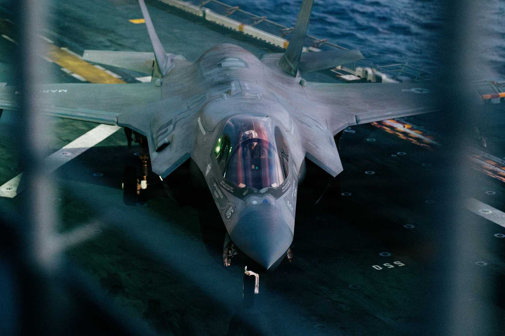 Marine Corps F-35B Lightning II assigned to Marine Fighter Attack Squadron (VMFA) 122, 11th Marine Expeditionary Unit, stages on the flight deck.-1
