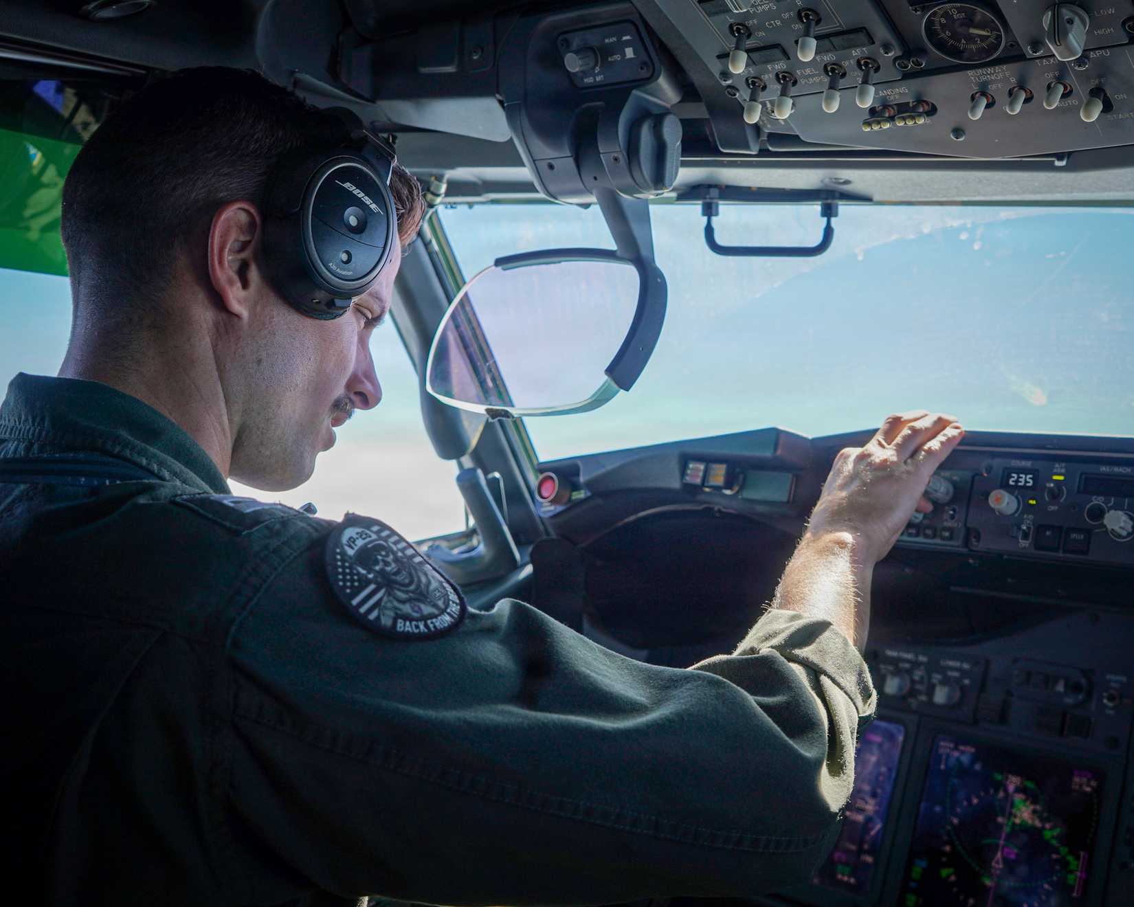Navy Lt. Mike Coritz, assigned to Patrol and Reconnaissance (VP) Squadron 26 Combat Aircrew Team Five, pilots a P-8A Poseidon.
